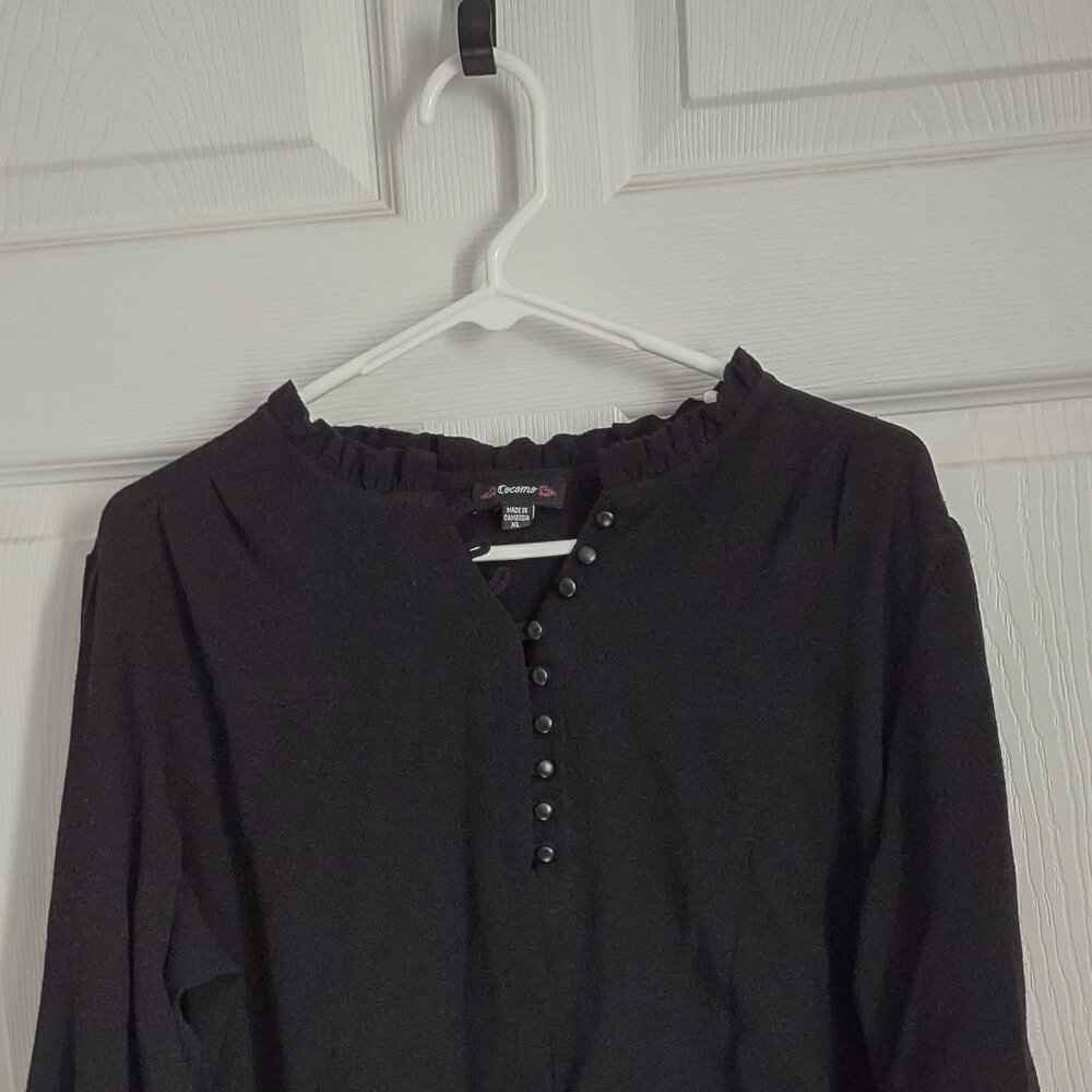 Black blouse with faux leather cuff